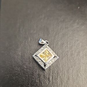 Elegant Silver and Yellow Pendant